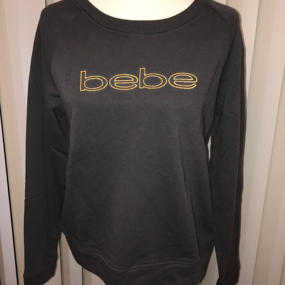 NWT Bebe pull over